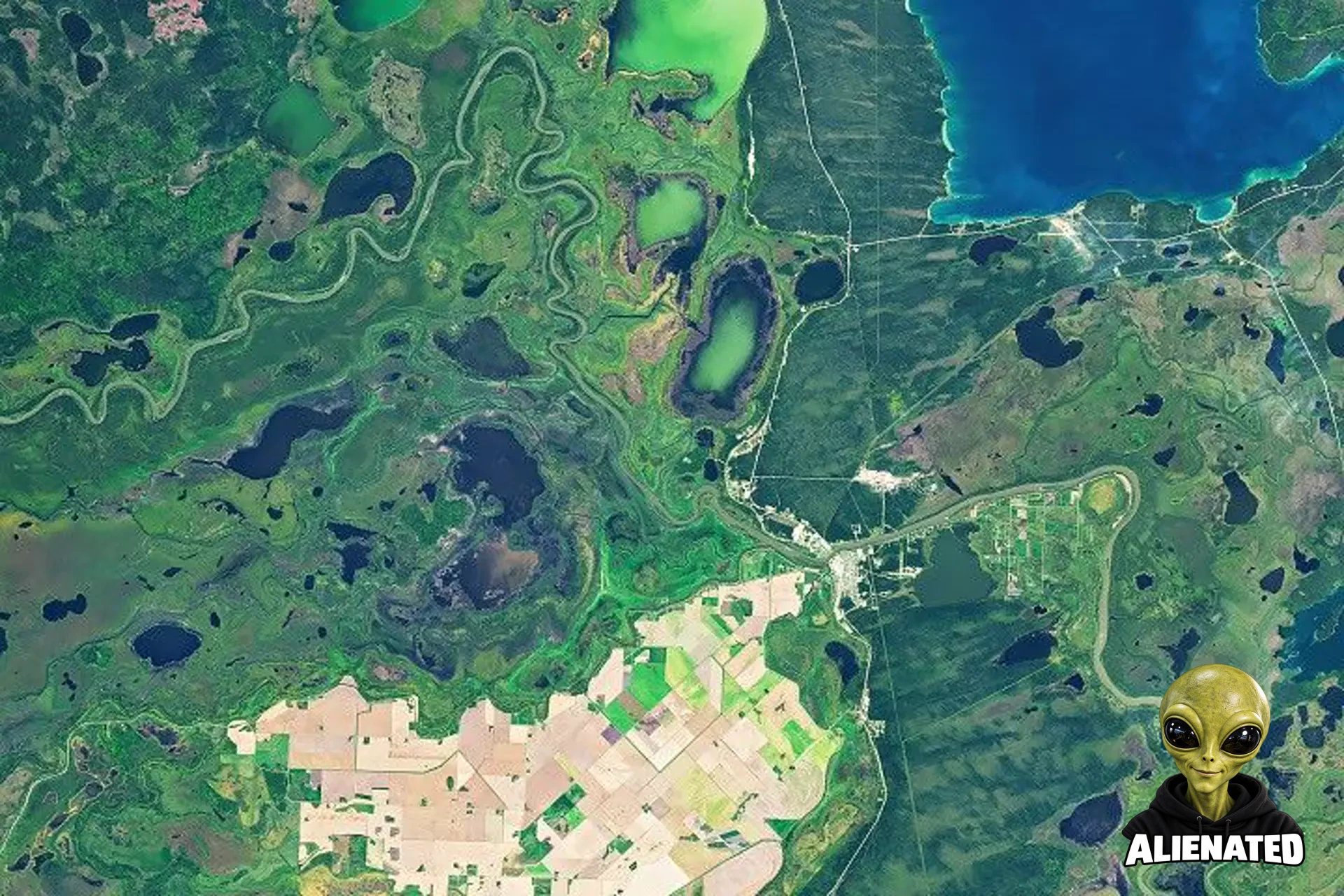 The same area in autumn shows many of the farm fields are now brown, and the surrounding wetlands hold less water.