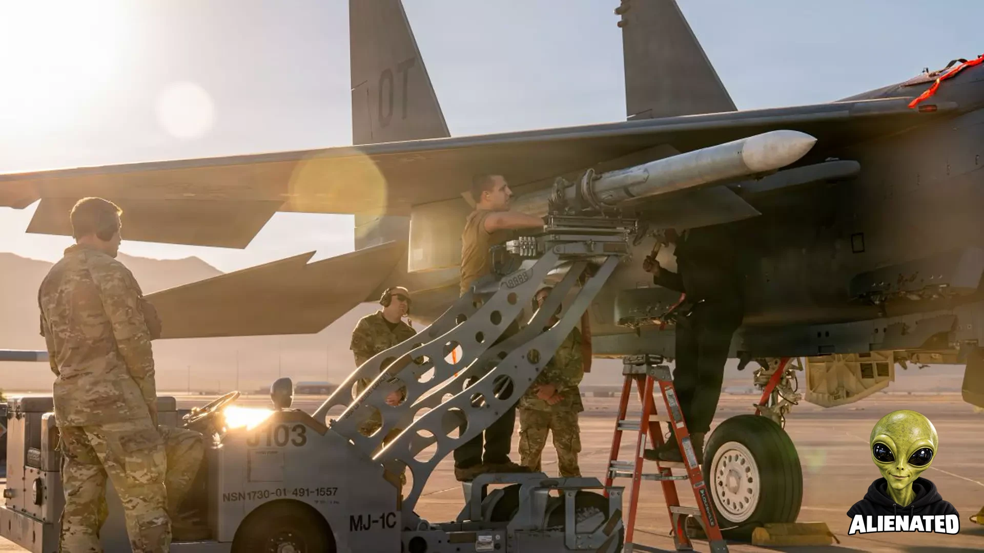 U.S. Airmen assigned to the 757th Aircraft Maintenance Squadron load an inert munition onto an F-15E Strike Eagle aircraft at Nellis Air Force Base, Nevada, Oct. 2, 2026. The Airmen competed in the 3rd Quarter Load Competition in which seven aircraft maintenance teams were assessed on their technical, mental, and physical proficiency. (U.S. Air Force photo by Airman 1st Class Heather Amador Paulino)