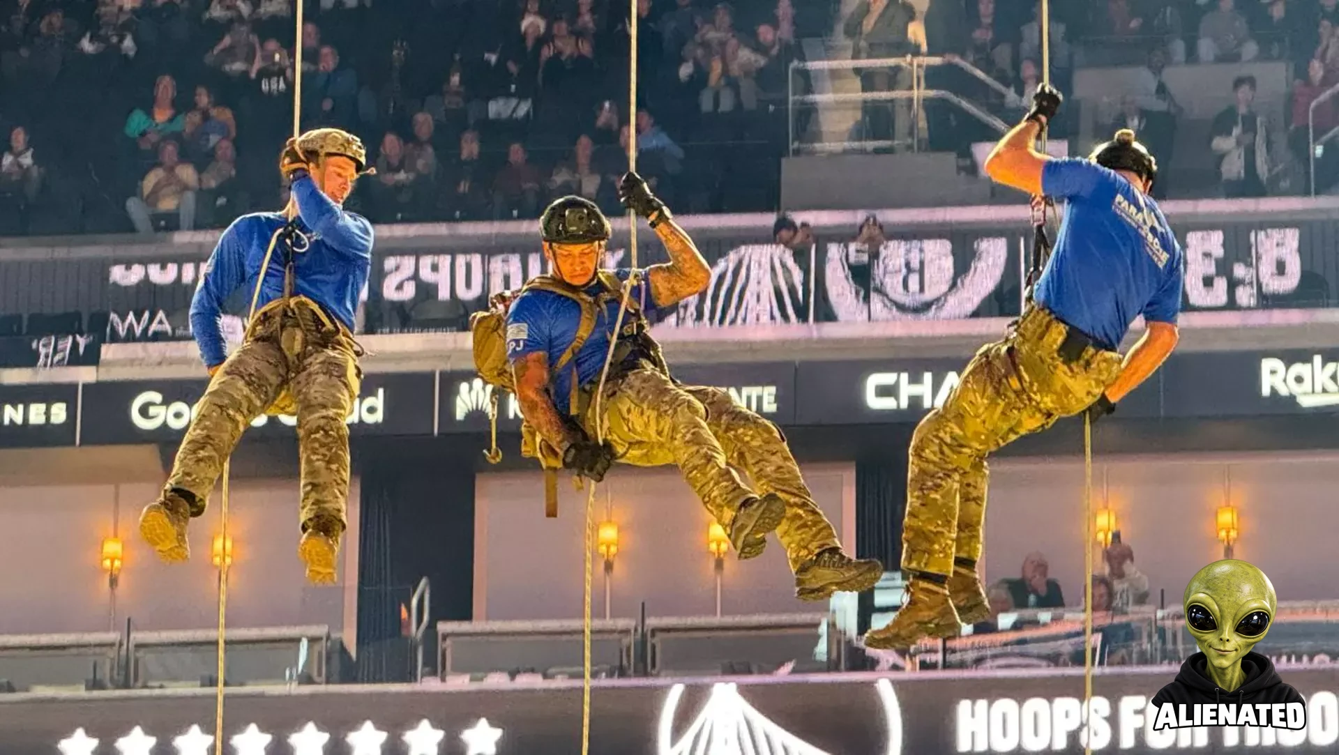 U.S. Air Force pararescuemen assigned with the 131st Rescue Squadron, 129th Rescue Wing, California Air National Guard perform a rappel demonstration to deliver the game ball at the Golden State Warriors' Hoops for Troops military appreciation game at Chase Center, San Francisco, Nov. 25, 2024. (U.S. Air National Guard video by Staff Sgt. Duane Ramos)